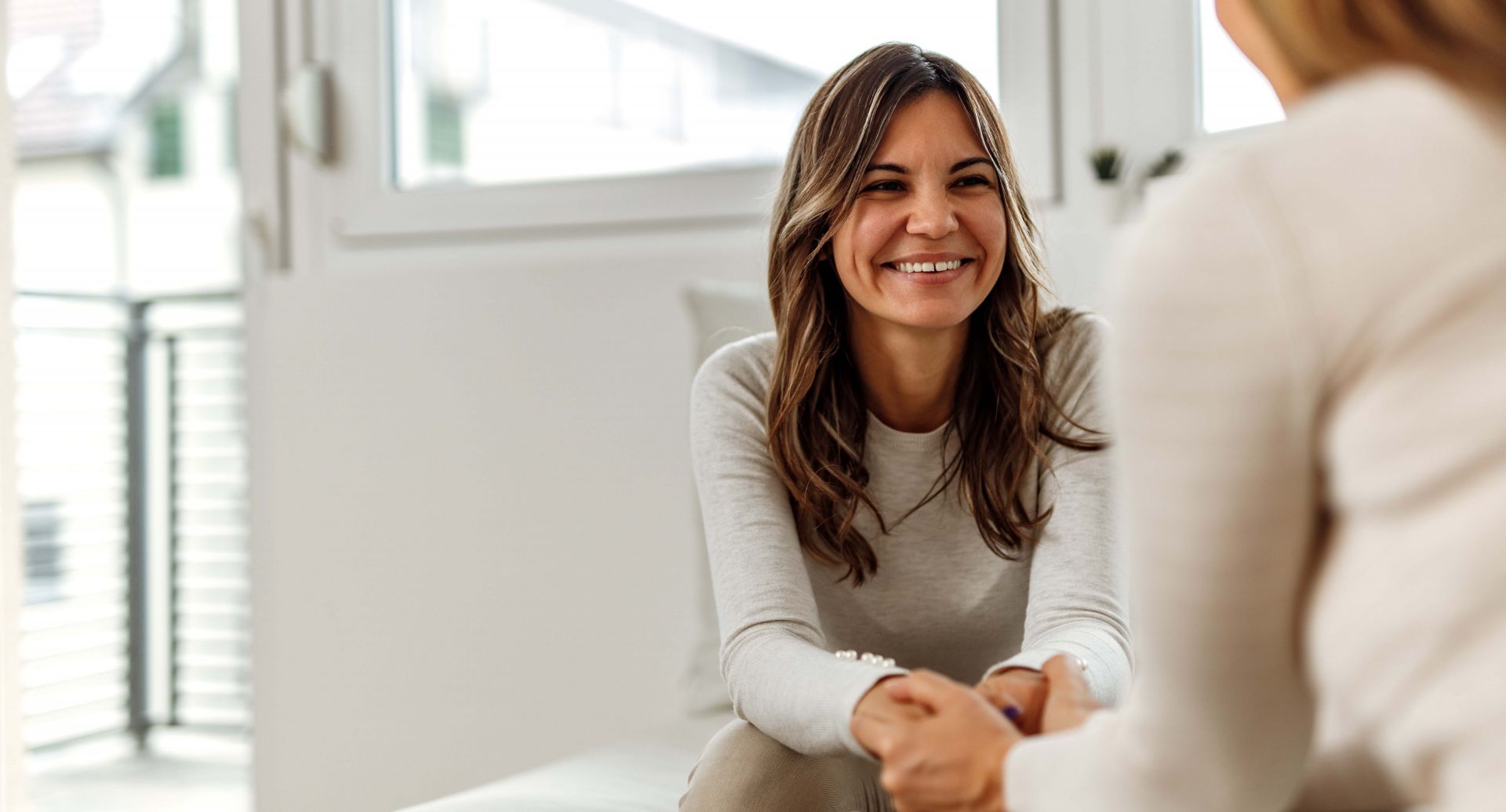 woman smiling discussing mental health